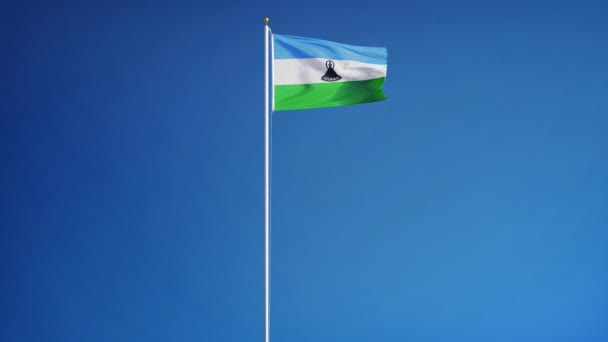 Bandera Lesotho en cámara lenta en bucle sin problemas con alfa — Vídeo de stock
