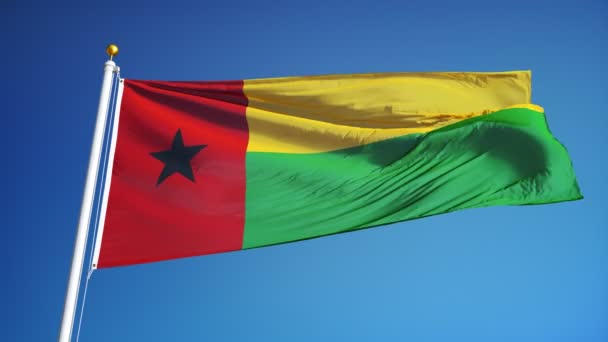 Bandera de Guinea-Bissau en cámara lenta en bucle continuo con alfa — Vídeos de Stock