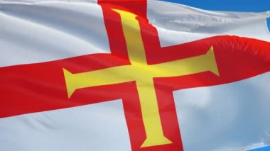 Guernsey bayrağı yavaş çekimde sorunsuz alfa ile döngülü