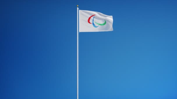 Bandeira dos Jogos Paralímpicos Rio 2016 em câmera lenta perfeitamente enrolada com alfa — Vídeo de Stock