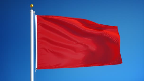 Κόκκινη σημαία σε αργή κίνηση με απρόσκοπτη βρόχο με άλφα — Αρχείο Βίντεο