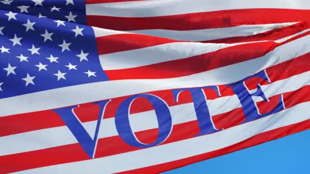 Голосование 2016 Президентские выборы в США флаг в замедленной съемке зациклен на альфе — стоковое видео