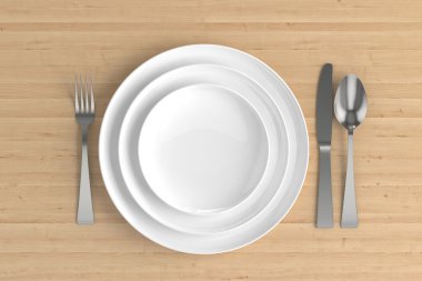 üç iki boş tabak, kaşık, çatal ve bıçak