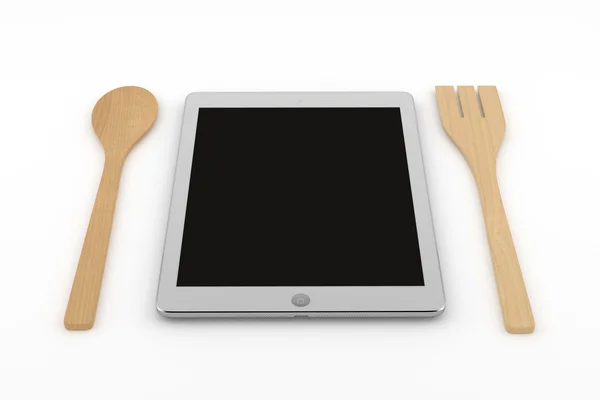 Tablet ordenador con cuchara de madera y tenedor —  Fotos de Stock