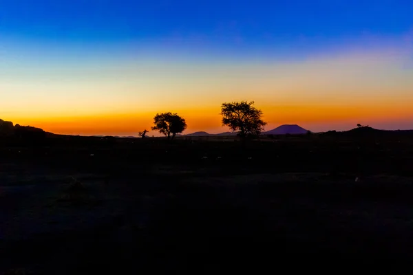 Východ slunce krajina v Súdánu. — Stock fotografie