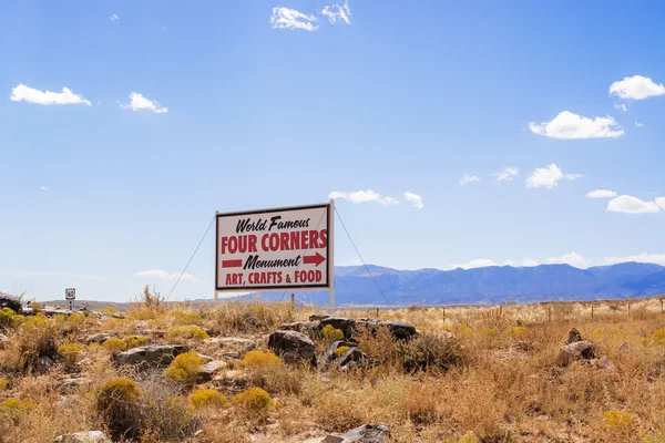 Sign pointing to Four Corners monument in USA — Stock Photo, Image