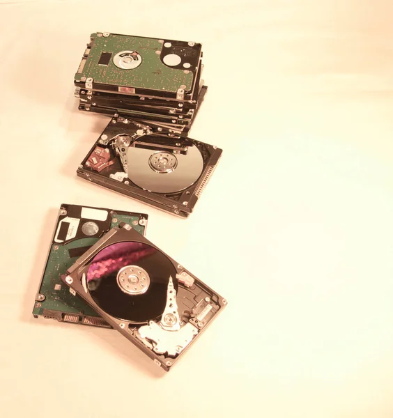 several hard drives from a laptop, taken in close-up