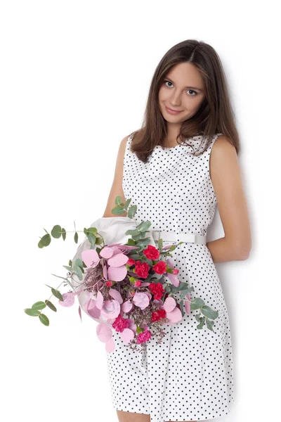 年轻可爱的女子捧着束鲜花 — 图库照片
