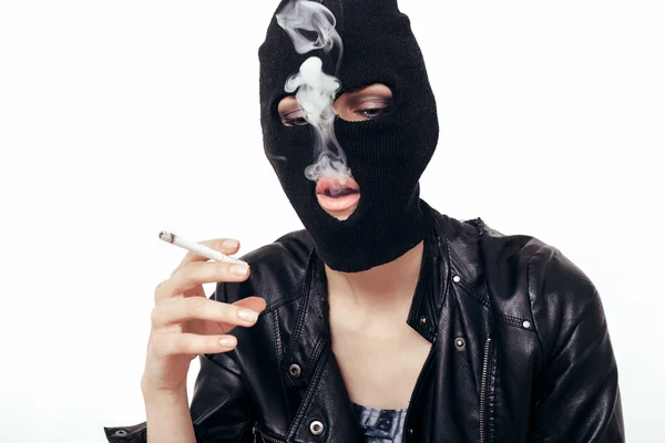 Sexy girl in balaclava smoking cigarette — Stock Photo, Image