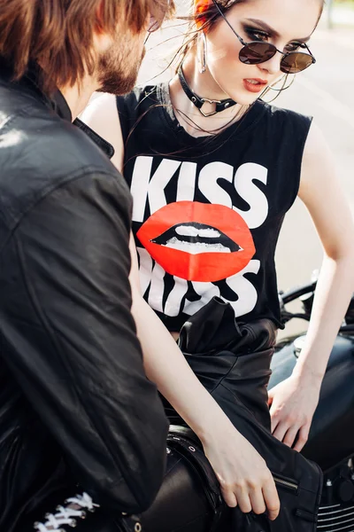 Couple in love and vintage custom motorcycle — Stock Photo, Image