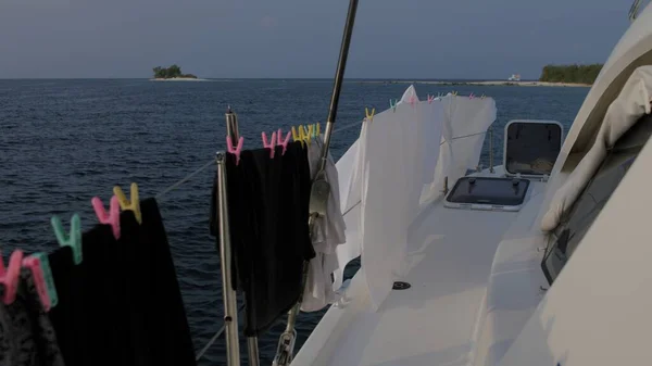 The laundry is drying on the boat — стоковое фото