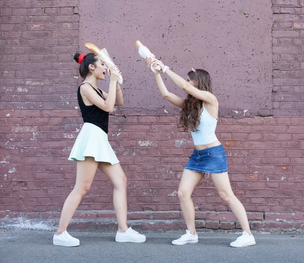 Two women fighting bread — Stock Photo, Image