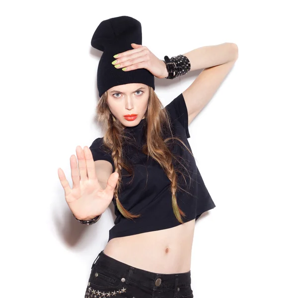 Fashion girl hipster. Swag woman in black clothes showing stop gesture Royalty Free Stock Photos