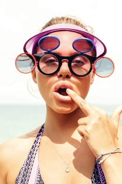 Beautiful sexy woman showing middle finger obscene gesture — Stock Photo, Image