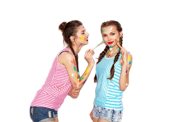 Pretty girl friends having fun. Women smeared in paint — Stock Photo, Image