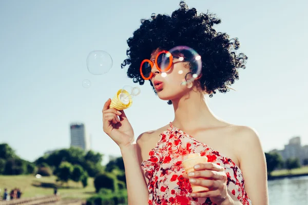 Vintage photo of soap bubble blower woman — Stock Photo, Image