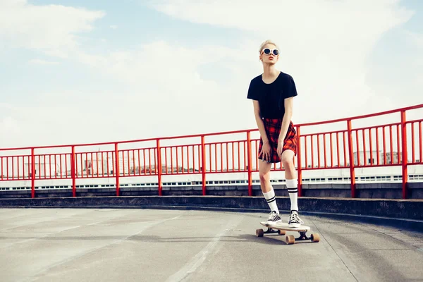 Pretty sexy young seductive woman with longboard — Stockfoto