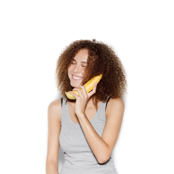 Jonge mooie vrouw makend pret met banaan — Stockfoto