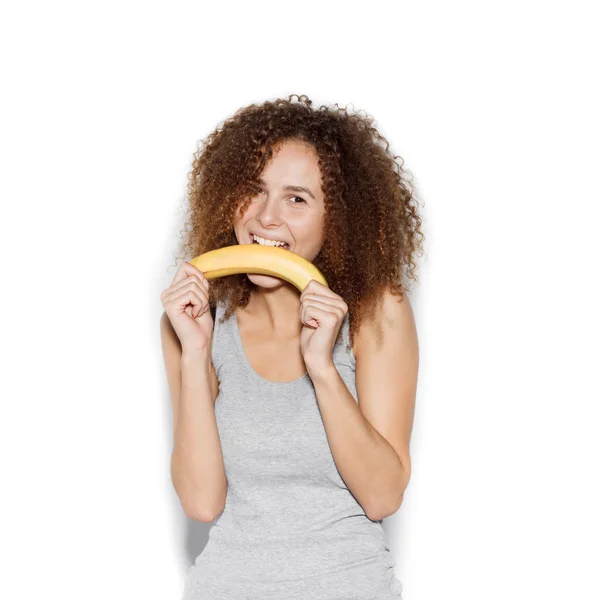 Jonge mooie vrouw makend pret met banaan — Stockfoto