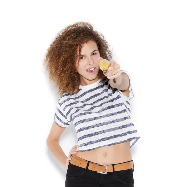 Young pretty woman making fun with banana — Stock Photo, Image