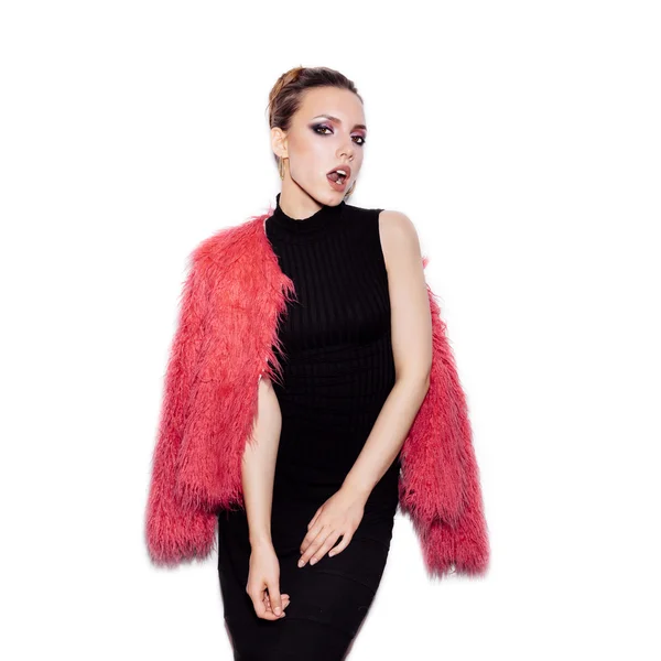 Fashion Girl wearing black dress and pink fur coat — Stock Photo, Image