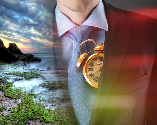 Concept of time with businessman and clock — Stock Photo, Image