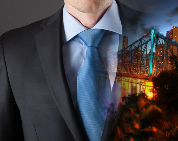 Concept of time with businessman and city — Stock Photo, Image