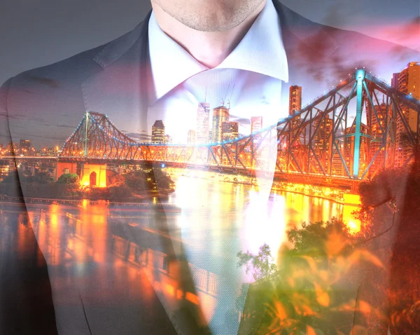 Concept of time with businessman and city — Stock Photo, Image