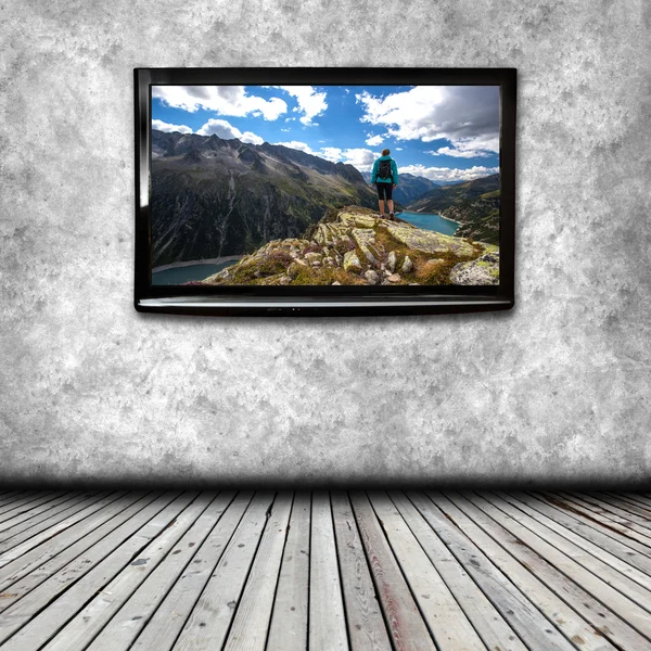 Plasma TV on the wall of the room — Stock Photo, Image