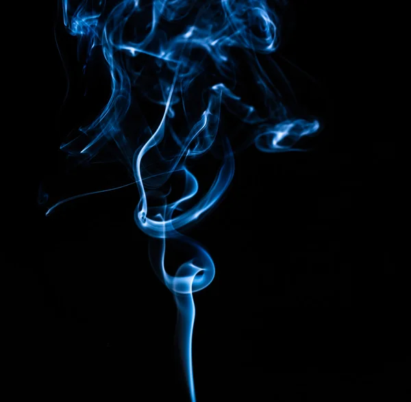 Abstract colorful smoke on the black background — Stock Photo, Image