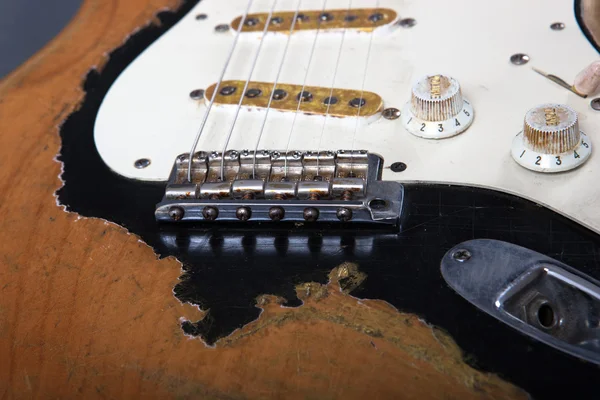 Electric guitar on grey background — Stock Photo, Image