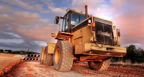 Grävlastare lastare eller bulldozer - grävmaskin — Stockfoto