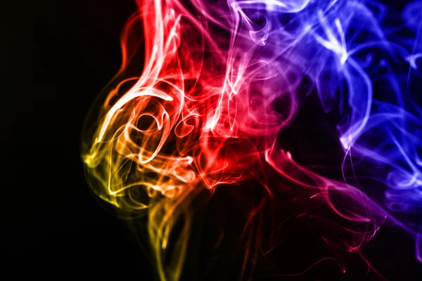 Abstract colorful smoke on the black background — Stock Photo, Image