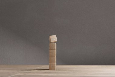 Şekil olarak düzenlenmiş ahşap küp, sembol veya logo oluşturma, iş büyümesi ve yönetim konsepti için modelleme.