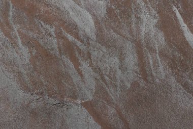 Karanlık taş ya da kaya dokusu arka planı. Yüksek çözünürlüklü duvar tasarımı