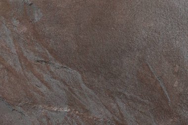 Karanlık taş ya da kaya dokusu arka planı. Yüksek çözünürlüklü duvar tasarımı