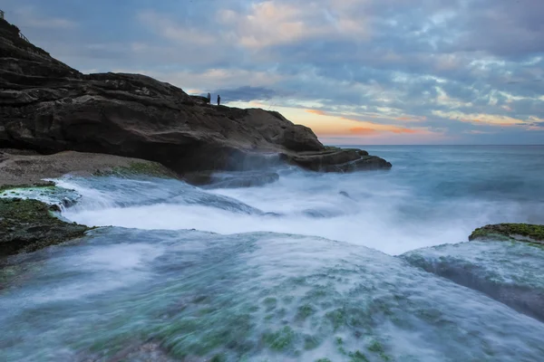 Pedras do mar ao pôr do sol — Fotografia de Stock