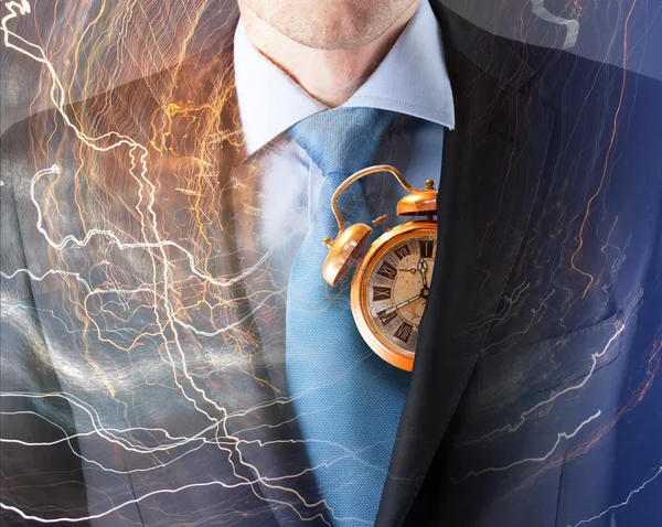 Concept of time with businessman and clock — Stock Photo, Image