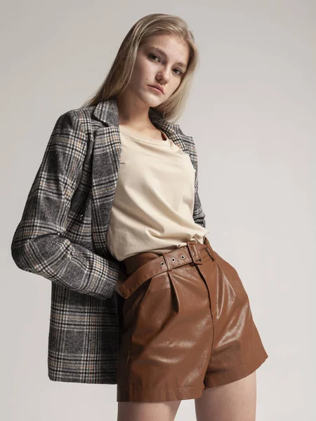 Portrait Blonde Plaid Jacket Leather Shorts Gray Background — Stock Photo, Image