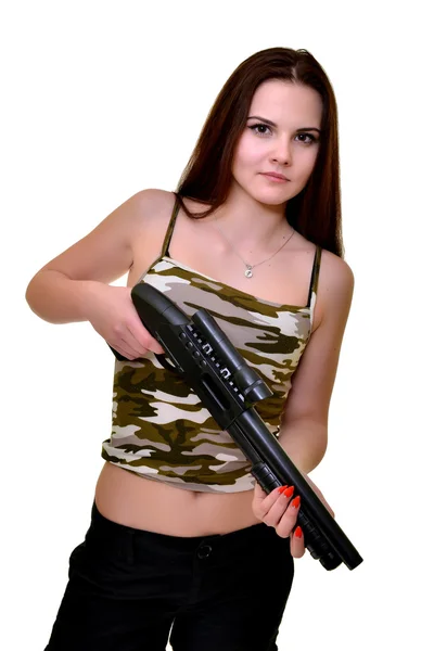 Beautiful woman standing with shotgun — Stock Photo, Image