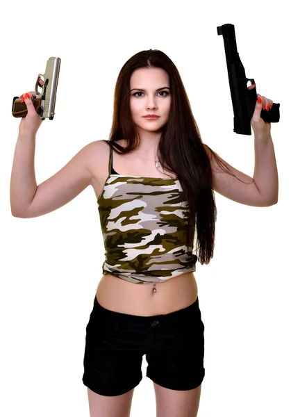 Красивая женщина с оружием — стоковое фото
