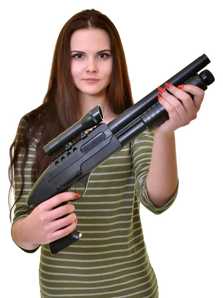 Beautiful woman standing with automatic rifle — Stock Photo
