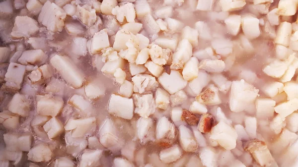 Bowl of salty pork greaves — Stock Photo, Image