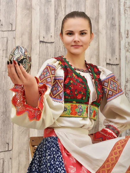 Slovakian girl with easter egg — Stock Photo, Image