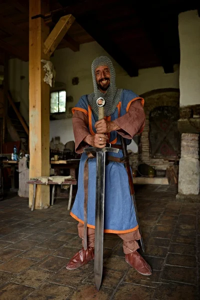 Medieval knight with sword — Stock Photo, Image