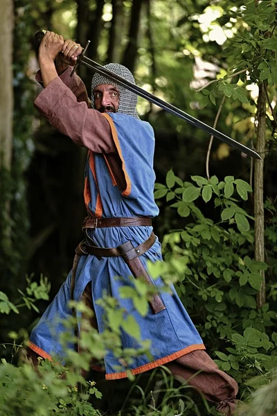 Medieval knight with sword — Stock Photo, Image