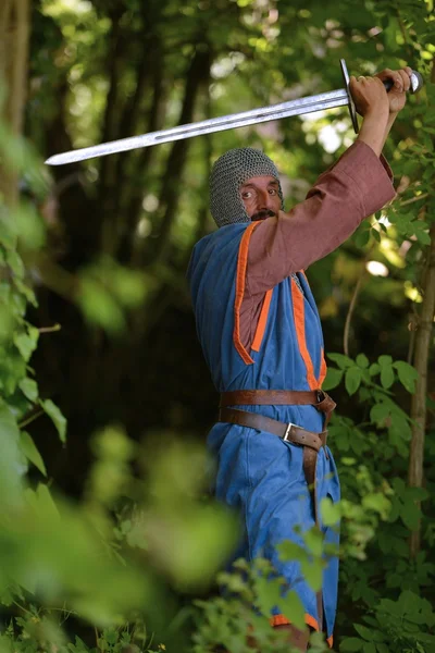 Medieval knight with sword — Stock Photo, Image