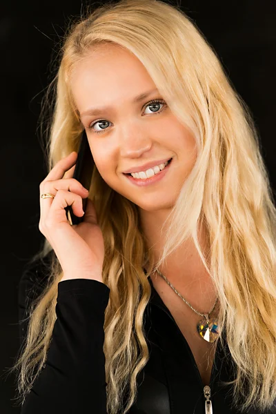 Sexig blond tjej med telefon — Stockfoto