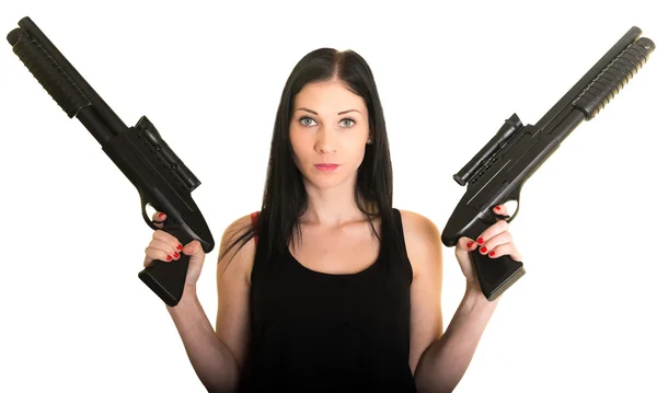 Красивая женщина с двумя пушками — стоковое фото