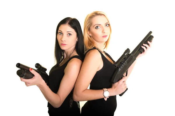 Two beautiful women with guns — Stock Photo, Image